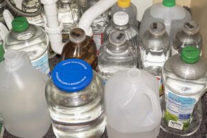 Old Water Storage -reused juice bottles - storage of water images - storage of water pictures